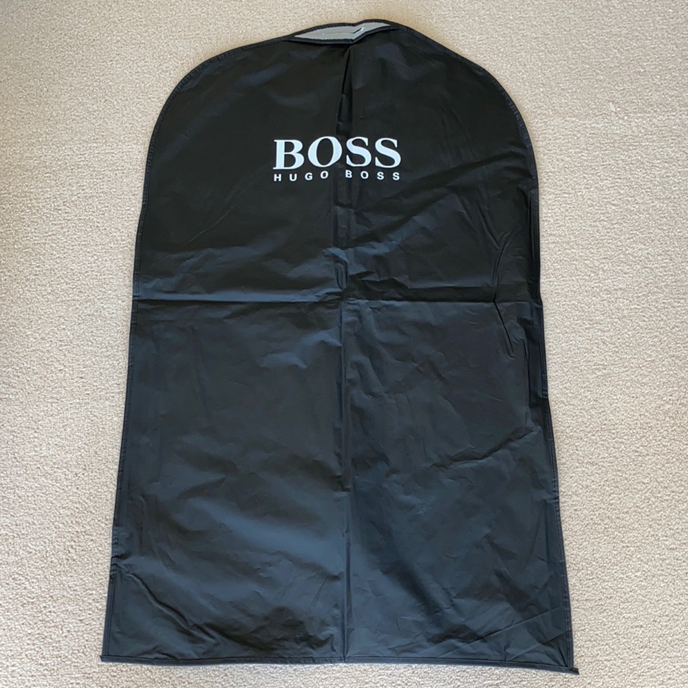 Hugo Boss black garment bag with white lettering.